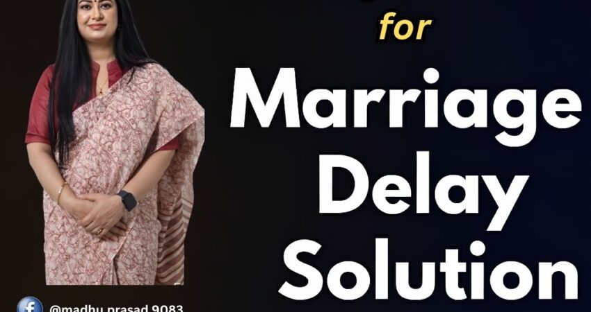 Astrologer Astromadhupriya sitting at a wooden table on a terrace with the Noida skyline in the background, an open book, a crystal ball, and tarot cards. A banner reads, "Astrologer in Noida for Marriage Delay Solution - Find your ideal partner with Astromadhupriya." Astrologer in Noida, Marriage Delay Solution, Astromadhupriya, Find your ideal partner, Noida skyline, crystal ball, tarot cards.